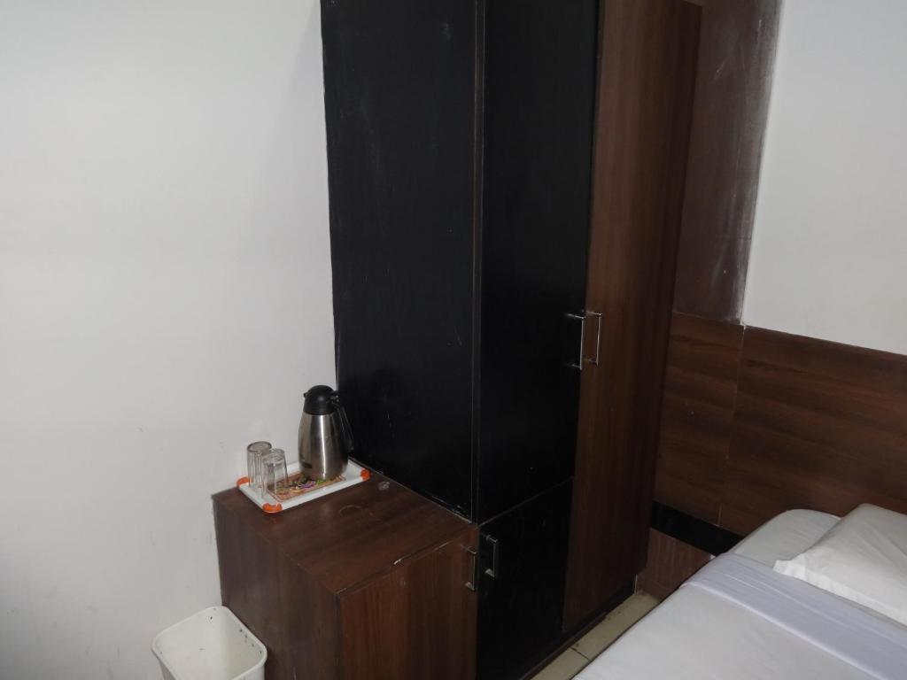 Hotel Miland Palace Bhuvanesvar Szoba fotó