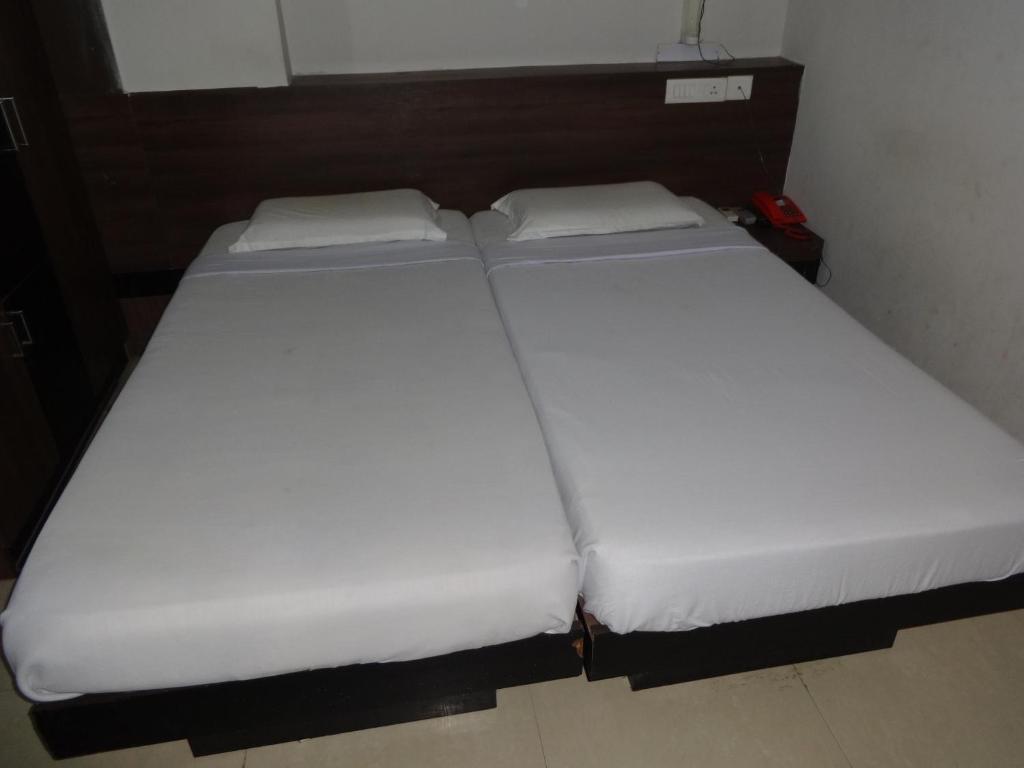 Hotel Miland Palace Bhuvanesvar Szoba fotó